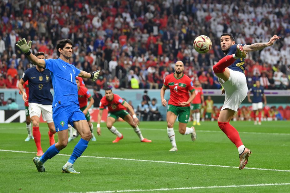 Theo Hernandez scores France's opening goal early in the match against Morocco.