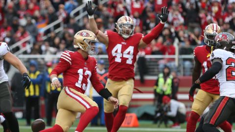 Purdy celebrates after scoring a touchdown in the second quarter of the game against the Bucs.