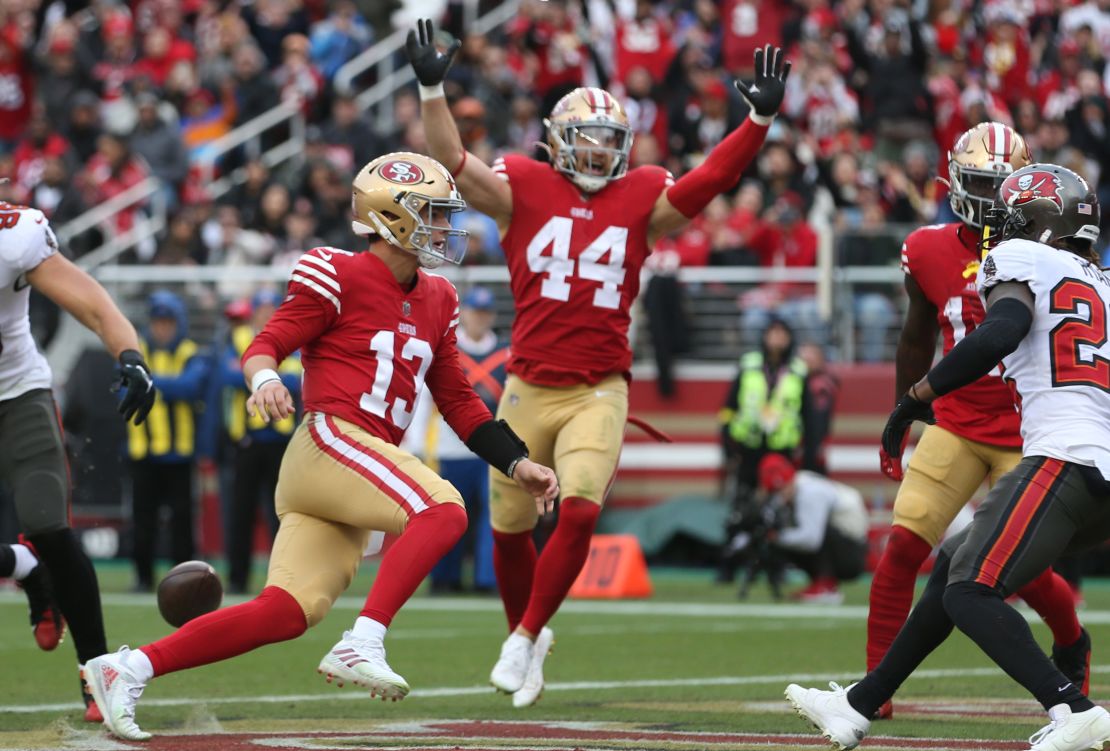 Purdy celebrates after scoring a touchdown in the second quarter of the game against the Bucs.