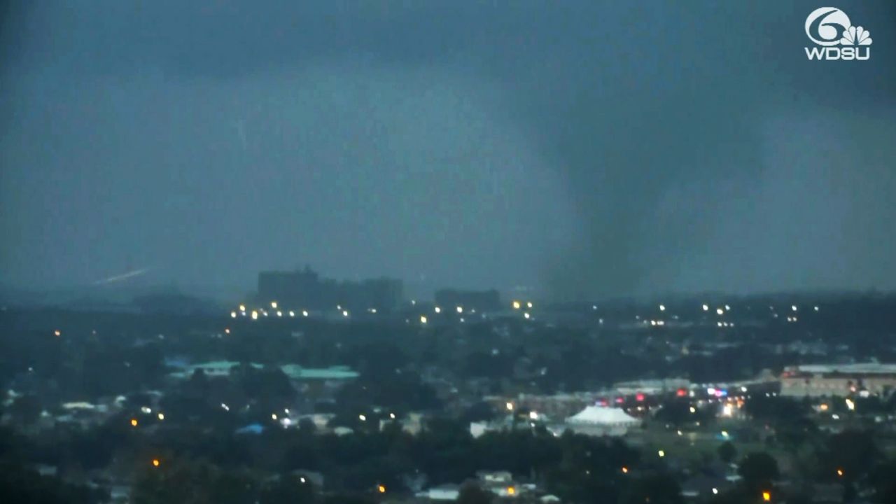 WDSU's Tower Camera has captured a large tornado on the ground in the Lower Ninth Ward and Arabi. 