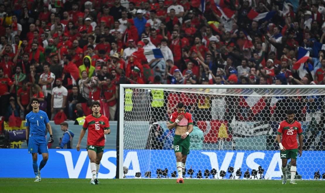 Moroccan players look desolate after conceding a goal to France.