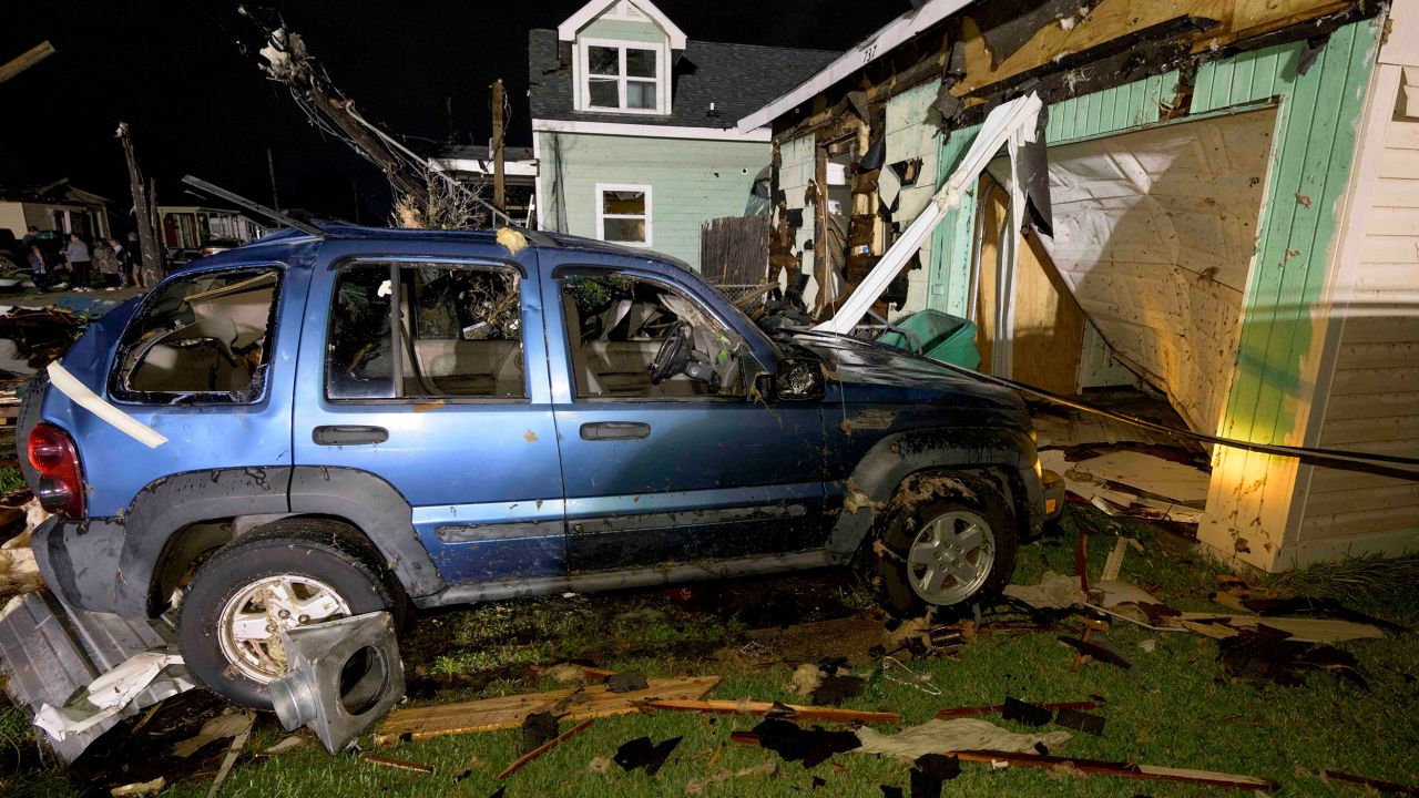 A tornado blew out a vehicle's windows and damaged or destroyed homes in Gretna, Louisiana. 