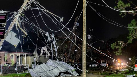 Power lines are mangled after a tornado struck Wednesday in Gretna, Louisiana.