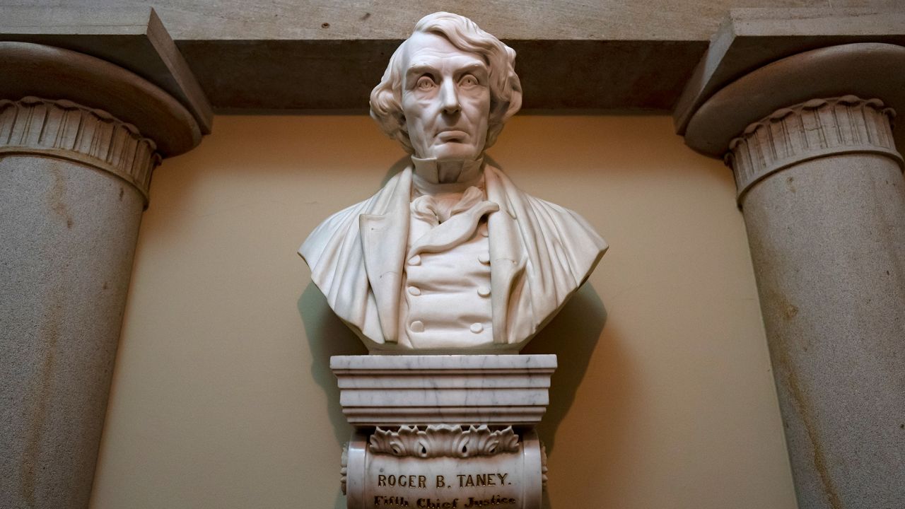 In this March 9, 2020 file photo, a marble bust of Chief Justice Roger Taney is displayed in the Old Supreme Court Chamber in the US Capitol in Washington.