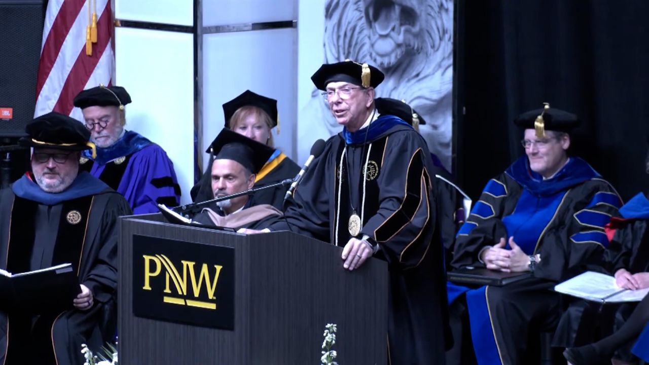 Chancellor Thomas Keon speaks at a Purdue University Northwest commencement ceremony. 