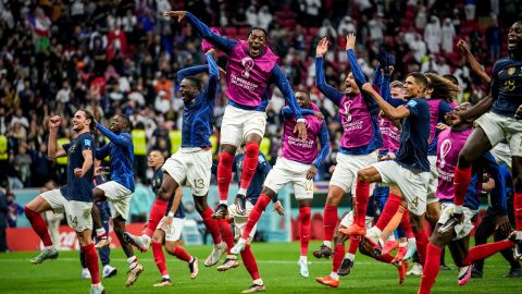 France players celebrate their team victory over England at the end of their World Cup quarterfinal.