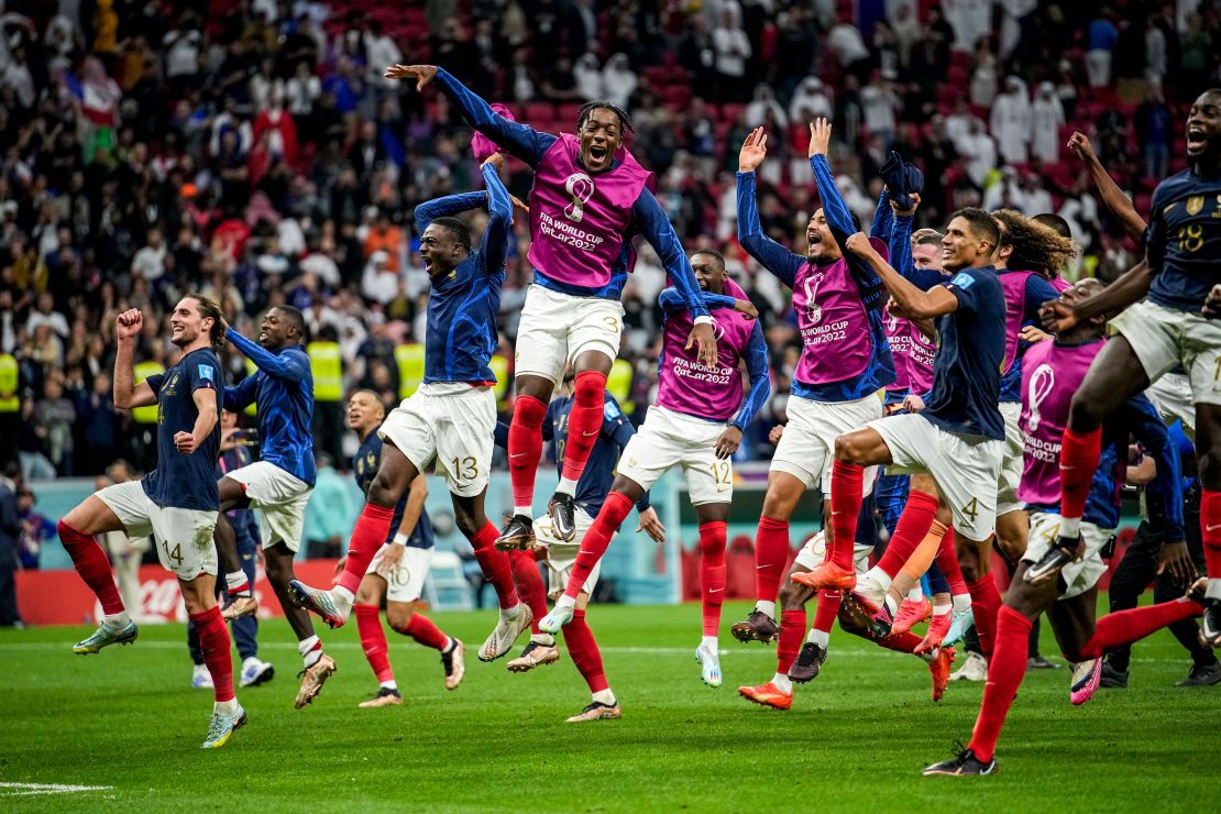 France players celebrate their team victory over England at the end of their World Cup quarterfinal.