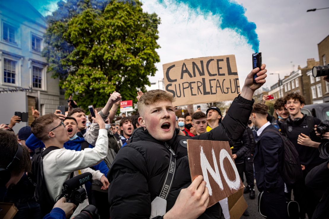 Fans of Chelsea Football Club protest against the European Super League outside Stamford Bridge on April 20, 2021.