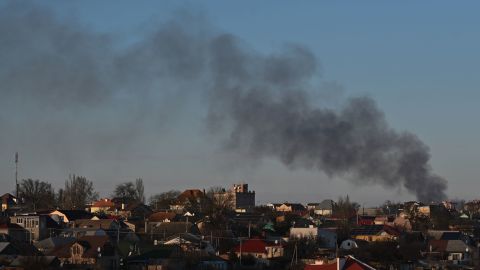 Smoke over Kherson on December 14. Russian shelling on the city in recent days has left it "completely disconnected" from power supplies, Ukrainian officials say.