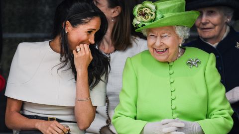 Queen Elizabeth II (left) with Meghan during their first shared royal engagement on June 14 2018.