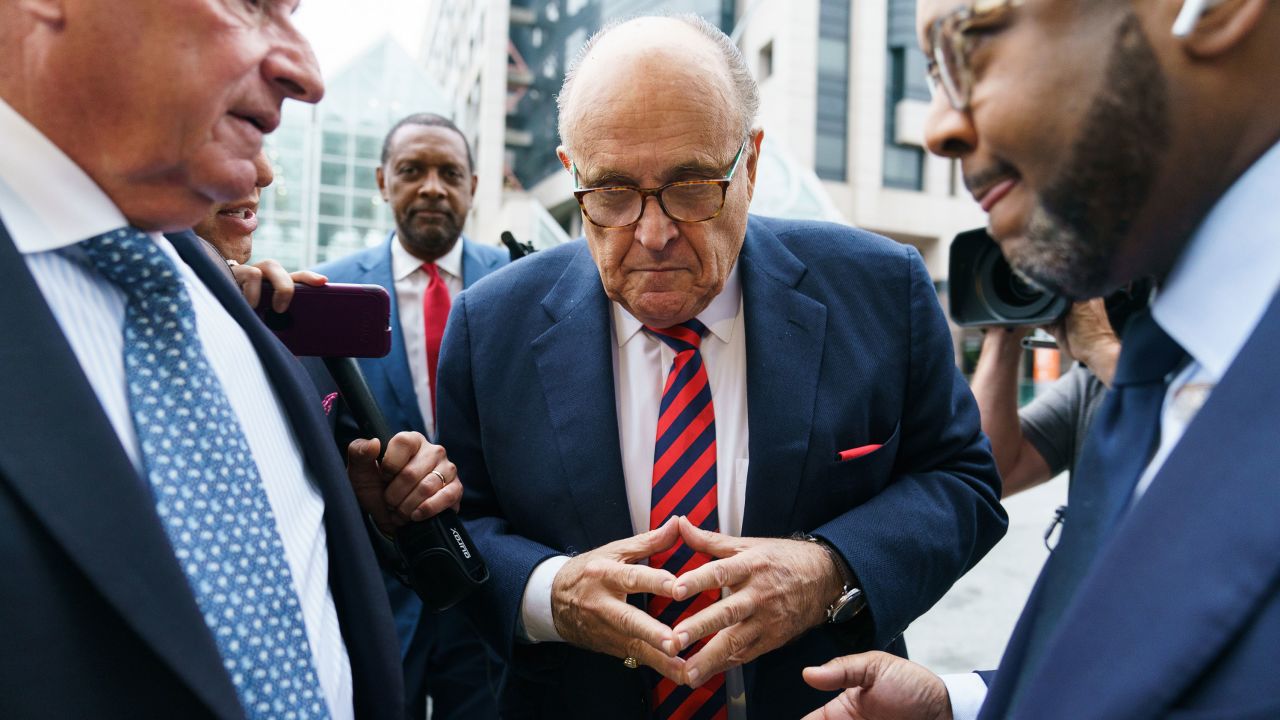 Rudy Giuliani, a former lawyer to Donald Trump, and his attorney Robert Costello, left, arrive at Fulton County Superior Court in Atlanta on August 17, 2022.