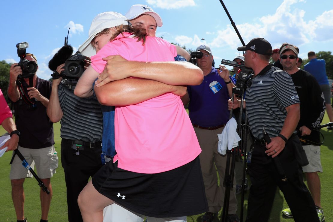 Spieth hugs Ellie after winning the DEAN & DELUCA Invitational at Colonial Country Club, Texas, in 2016.