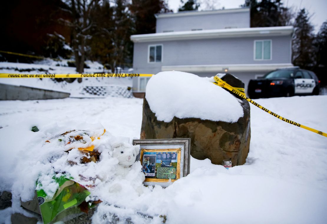 A memorial remembering Ethan Chapin, Madison Mogen, Xana Kernodle and Kaylee Goncalves sits in the snow outside of the residence where the four students were found killed on November 13 in Moscow, Idaho, U.S., November 30, 2022.  REUTERS/Lindsey Wasson