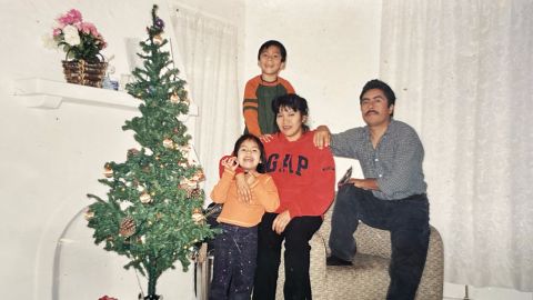 Ixchel Hernandez with her parents.