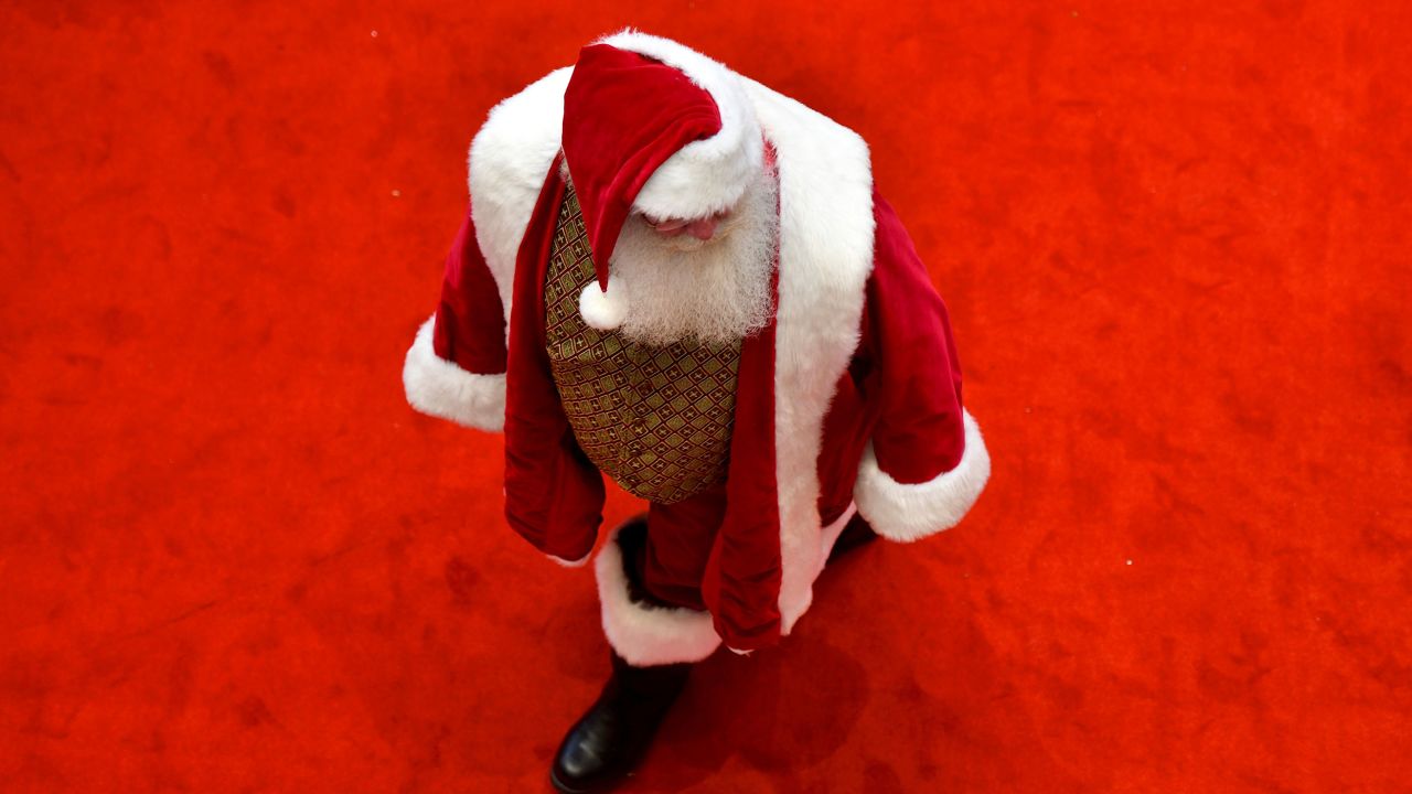 Santa Claus waits for visitors  at the King of Prussia Mall in  Pennsylvania on November 22, 2019. One expert on race says White people can become upset "when Santa is not the color that he's 'supposed' to be."