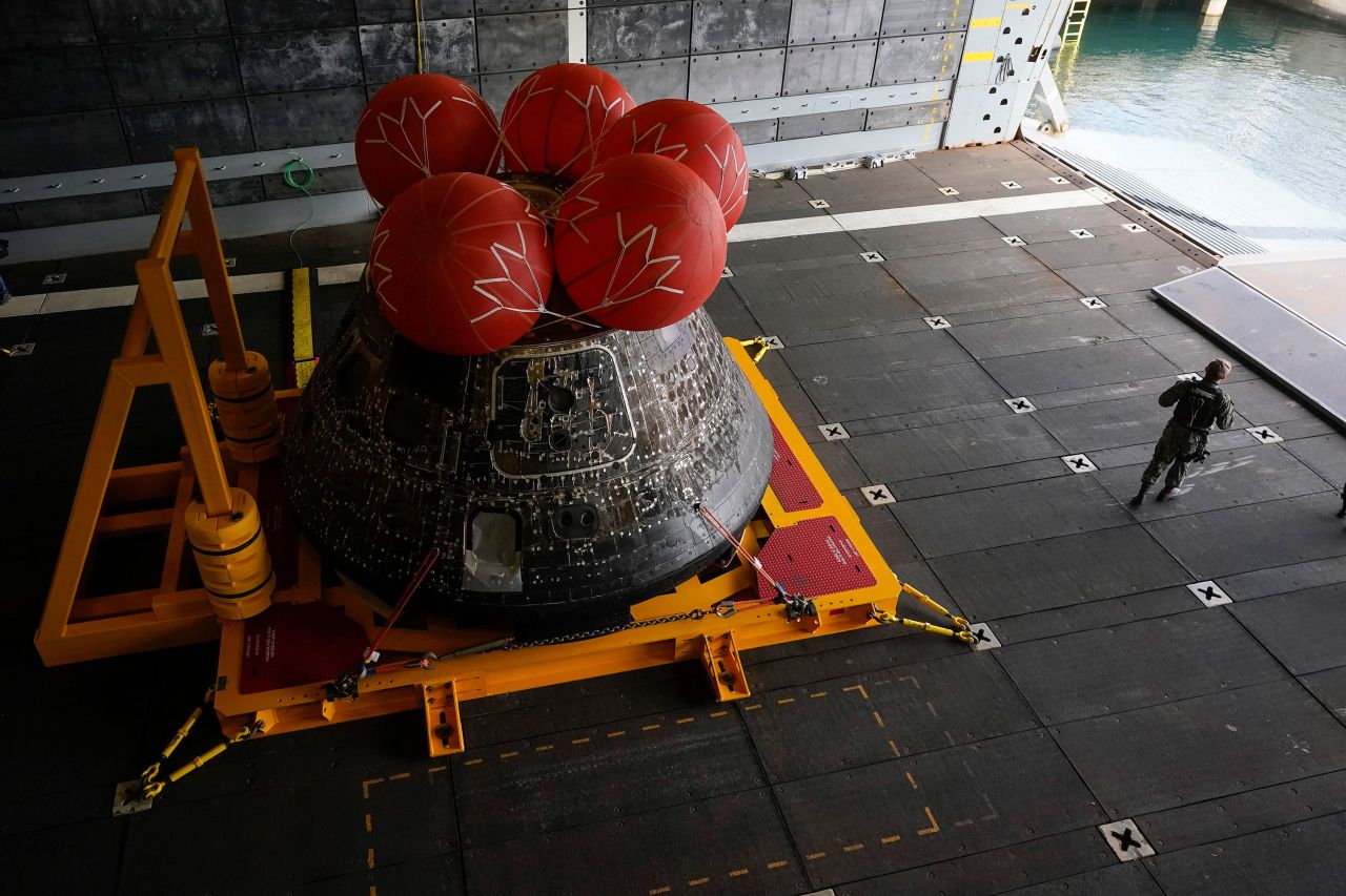A couple of days after <a href="https://www.cnn.com/2022/11/16/world/gallery/artemis-nasa-moon-mission/index.html" target="_blank">splashing back down to Earth</a>, NASA's Orion capsule sits aboard the USS Portland at a naval base in San Diego on Tuesday, December 13.