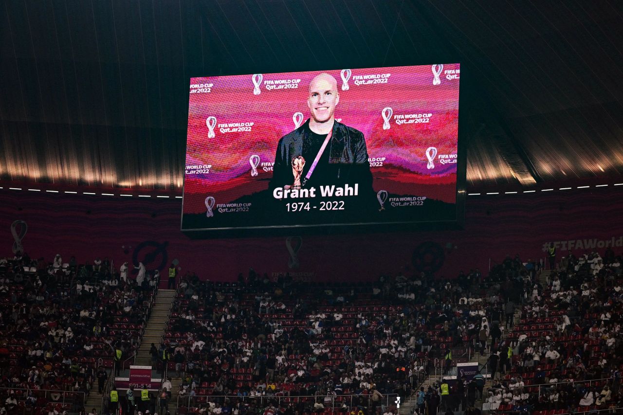 A video screen displays a photo of American journalist Grant Wahl during the World Cup quarterfinal between England and France on Saturday, December 10. Wahl, 49, died after collapsing during the quarterfinal match between Argentina and the Netherlands. His wife, Dr. Celine Gounder, said he <a href="https://www.cnn.com/2022/12/14/us/grant-wahl-cause-death/index.html" target="_blank">died of an aortic aneurysm that ruptured</a>.