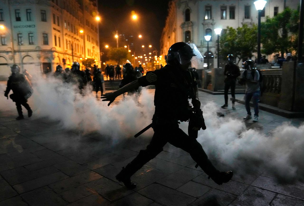 Tear gas is returned to police in Lima, Peru, who were trying to break up supporters of <a href="https://www.cnn.com/2022/12/15/americas/peru-castillo-detention-intl-latam/index.html" target="_blank">ousted President Pedro Castillo</a> on Sunday, December 11.