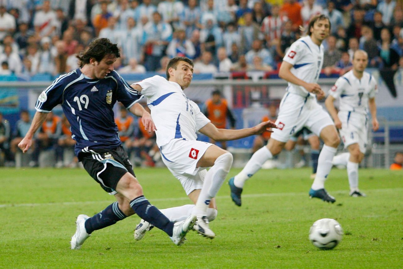 Messi scores against Serbia and Montenegro during a World Cup group-stage match in June 2006. Messi was the youngest Argentine to play and score in a World Cup. Argentina advanced to the quarterfinals that year and lost to Germany in a penalty shootout.