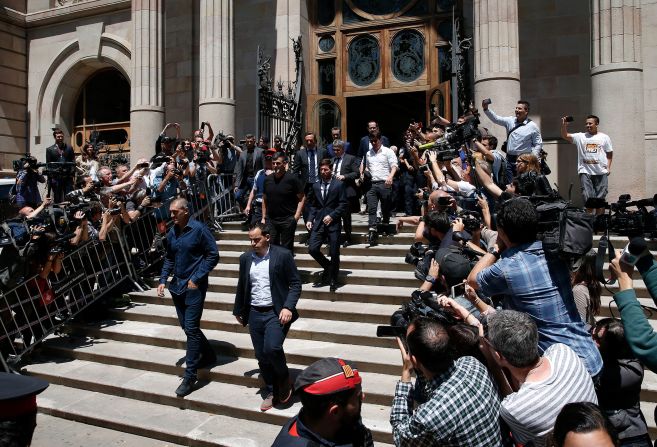 Messi leaves a courthouse in Barcelona in June 2016. A Barcelona court fined Messi €2 million ($2.3 million) and <a href="index.php?page=&url=https%3A%2F%2Fwww.cnn.com%2F2016%2F07%2F06%2Ffootball%2Flionel-messi-tax-guilty-sentence-21-months%2Findex.html" target="_blank">sentenced him to 21 months in prison for tax fraud.</a> But because it was his first offense and his sentence was less than two years, he wouldn't serve any jail time. In July 2017, the Spanish courts reduced Messi's prison sentence to an additional fine of €252,000 ($287,000).