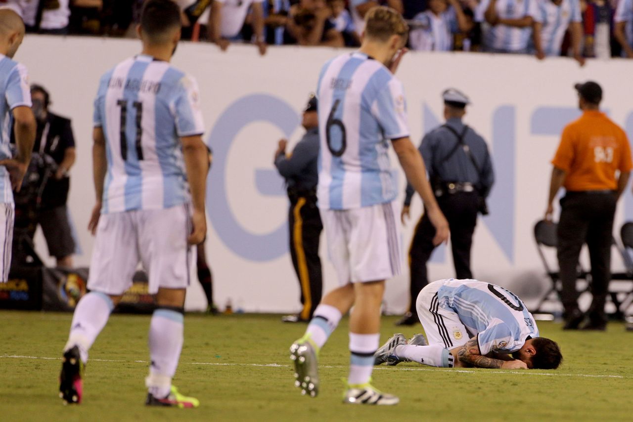 Messi collapses to the ground after missing in the penalty shootout that decided the Copa América final in June 2016. After the loss to Chile, Messi said he would probably retire from international soccer. He did not.
