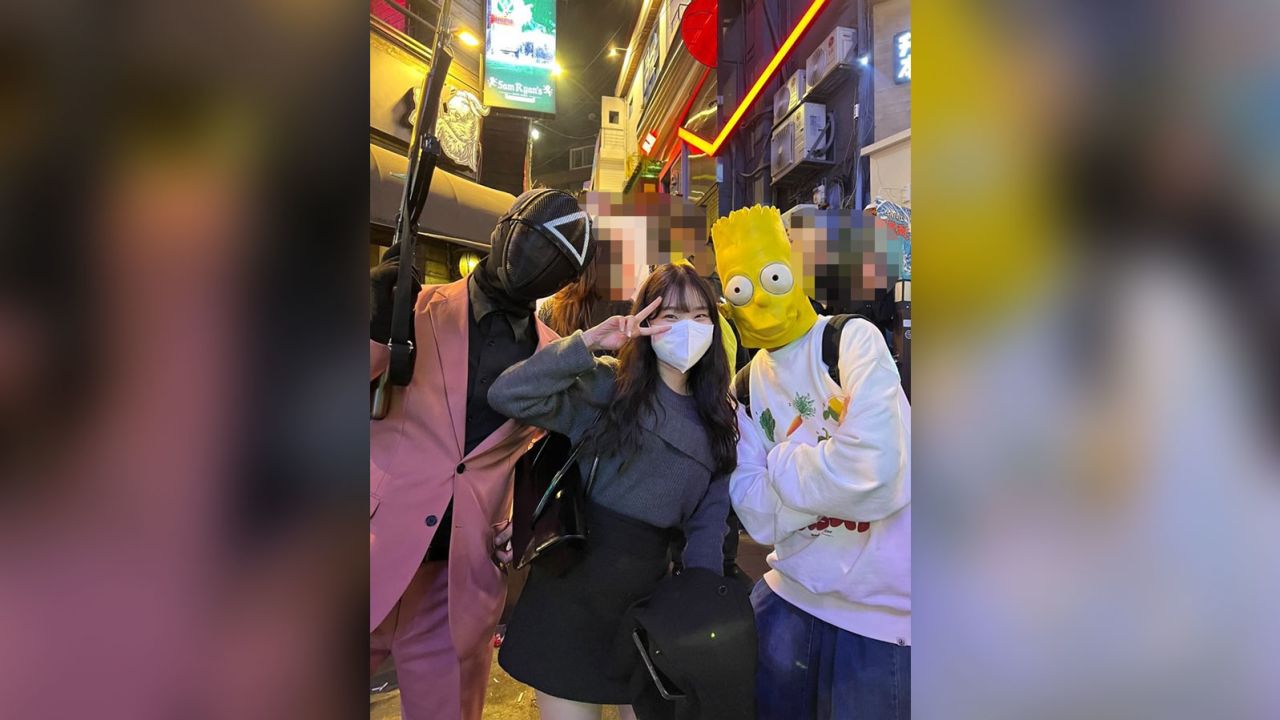 A photo of Ji-min and fellow revelers taken just minutes before the fatal crush. CNN obscured portions of this image to protect the identity of people in the background who did not consent to be photographed. 
