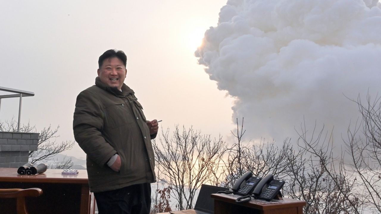 Kim Jong Un attends the test of what North Korean state media said was a solid-fueled rocket motor in a photo released on December 16, 2022.