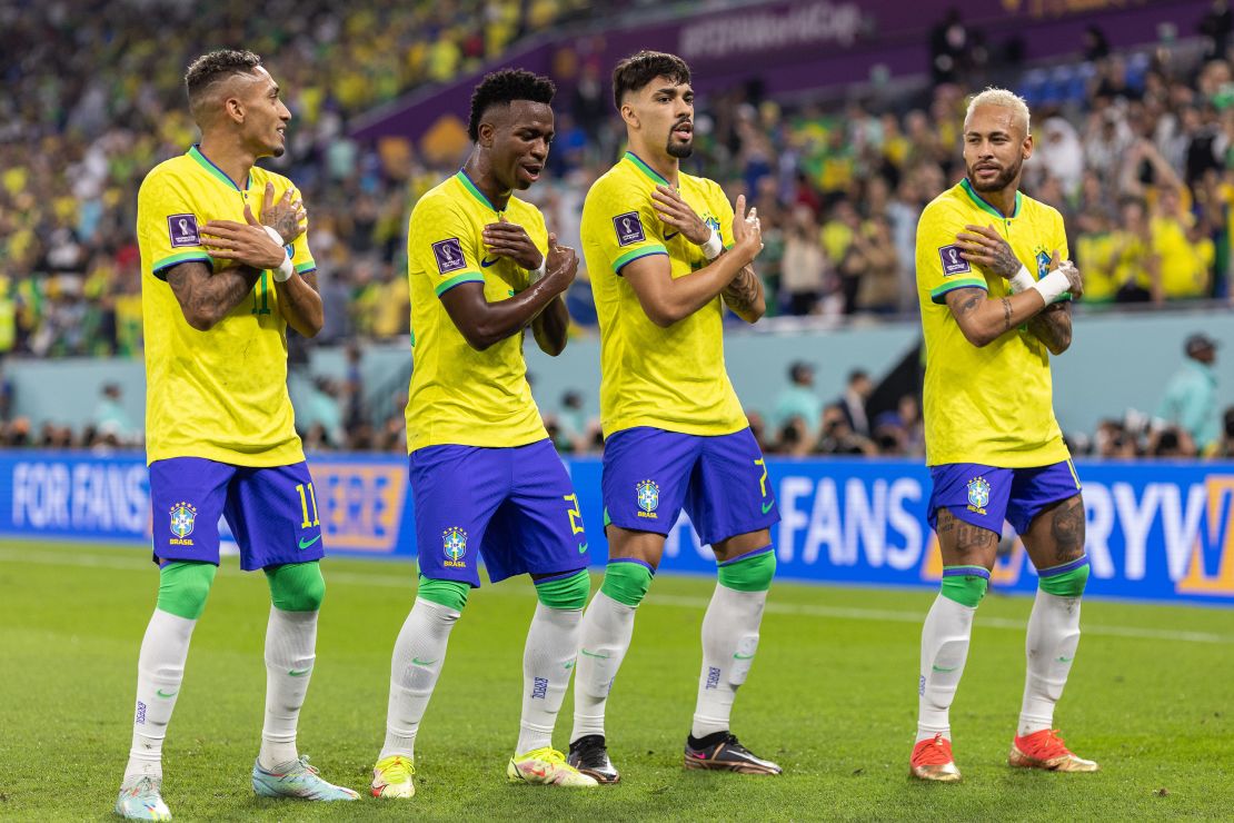Vinicius Junior of Brazil dancing with Raphinha, Lucas Paqueta and Neymar after scoring the team's first goal against South Korea.