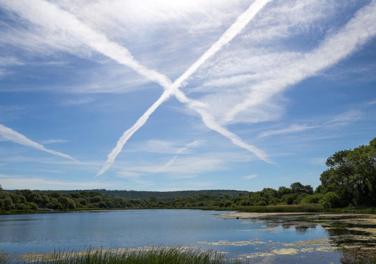Contrails are ice clouds, and form only under particular atmospheric conditions. They look harmless, but one study calculated that they could actually account for <a href="https://www.sciencedirect.com/science/article/pii/S1352231020305689" target="_blank" target="_blank">almost 60% of aviation's impact the on climate</a>.