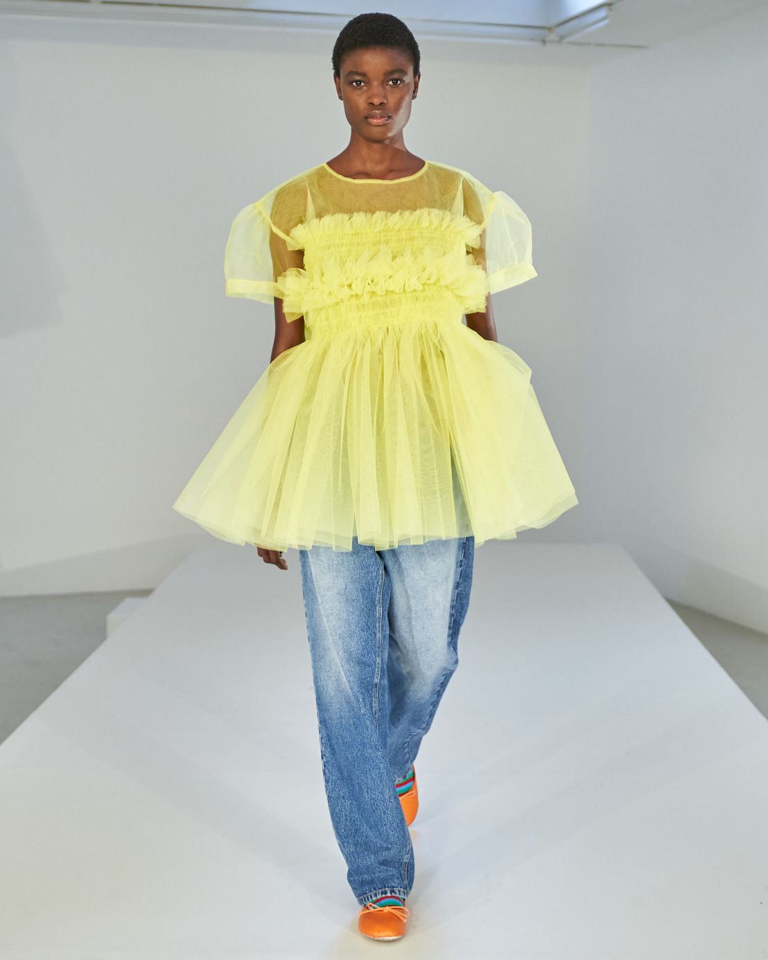 Jeans and dresses were a theme in Molly Goddard's London Fashion Week Spring-Summer 2022 presentation.