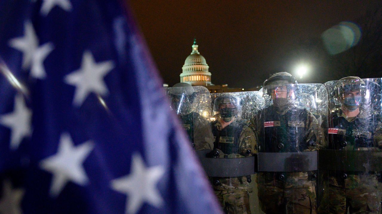Members of the DC National Guard are deployed outside of the US Capitol in Washington DC on January 6, 2021. 