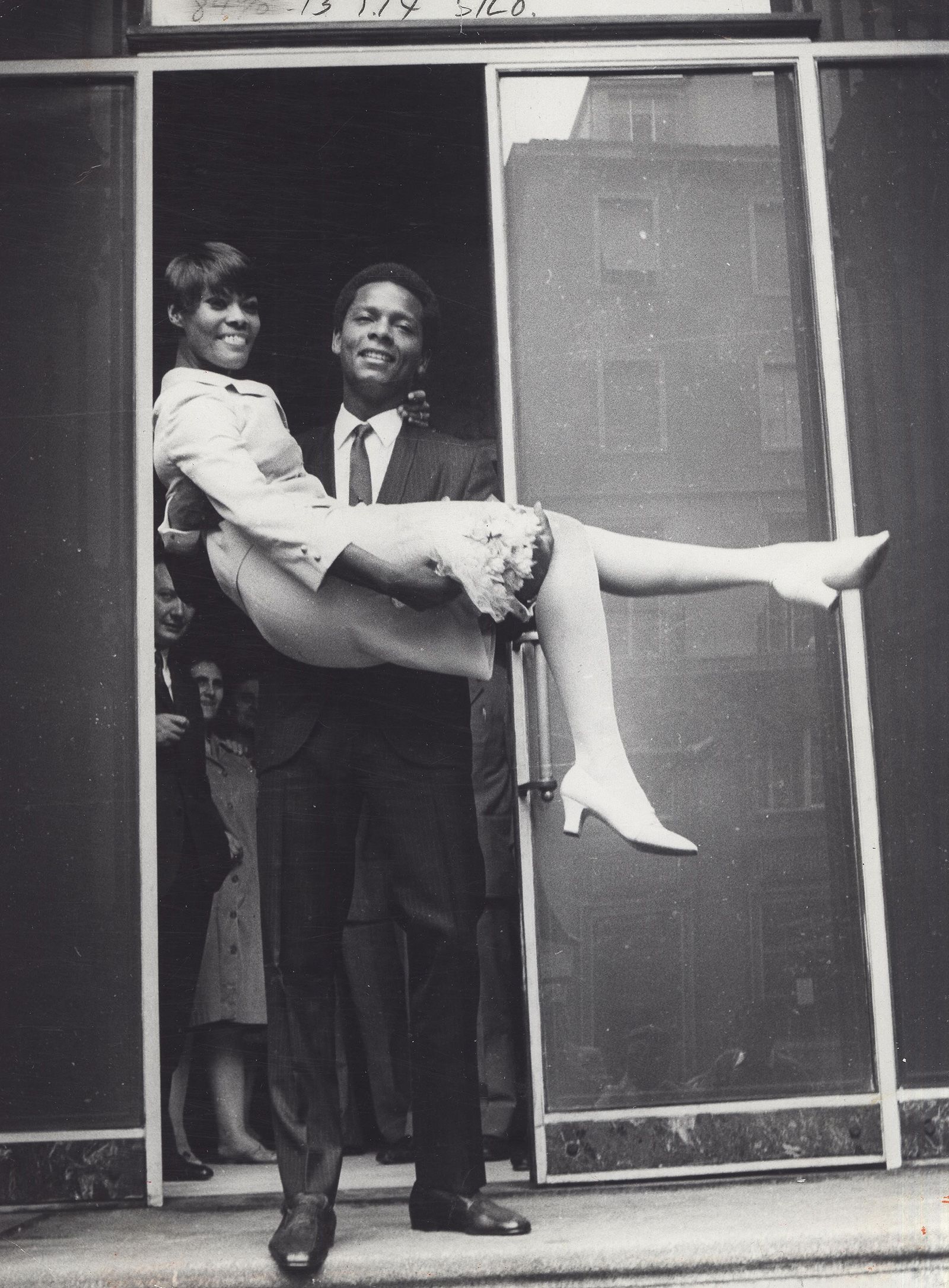 Musician William David Elliott carries Warwick at their second wedding in Milan, Italy, in August 1967.