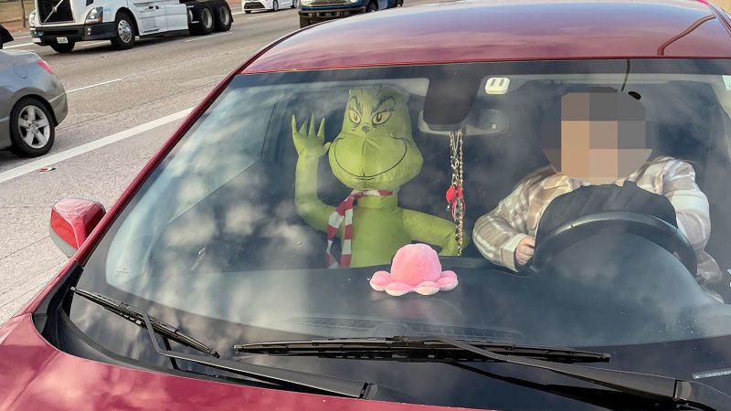 Arizona man ticketed for driving in the HOV lane with an inflatable Grinch in the passenger seat | CNN