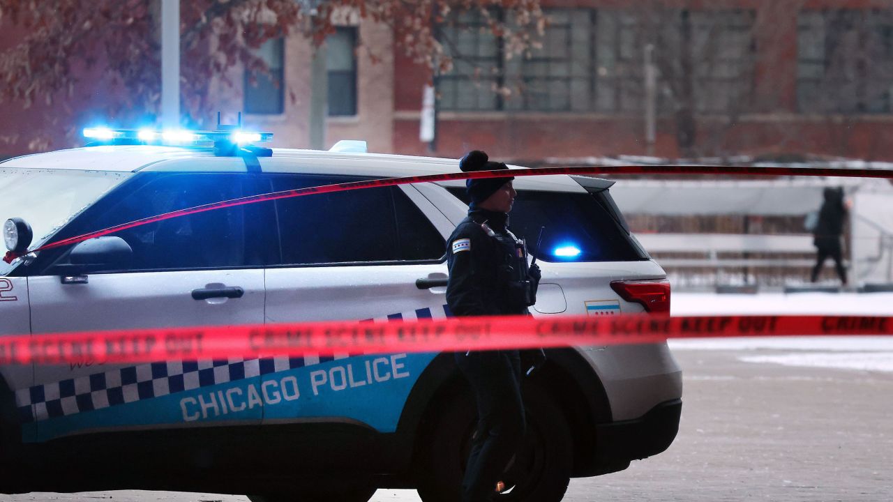 Chicago police secure a crime scene where four teens were shot -- two fatally -- on December 16, 2022.