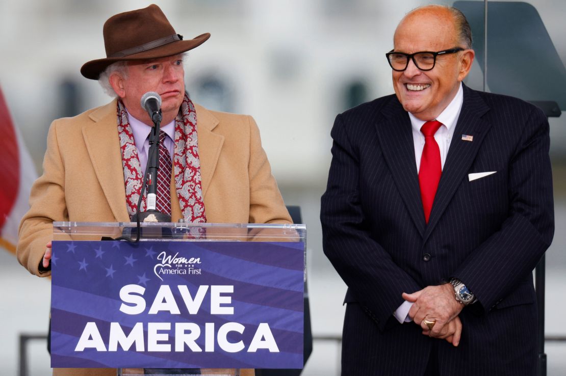 Attorney John Eastman speaks next to U.S. President Donald Trump's personal attorney Rudy Giuliani, as Trump supporters gather ahead of the president's speech to contest the certification by the U.S. Congress of the results of the 2020 U.S. presidential election on the Ellipse in Washington, U.S, January 6, 2021. Picture taken January 6, 2021.