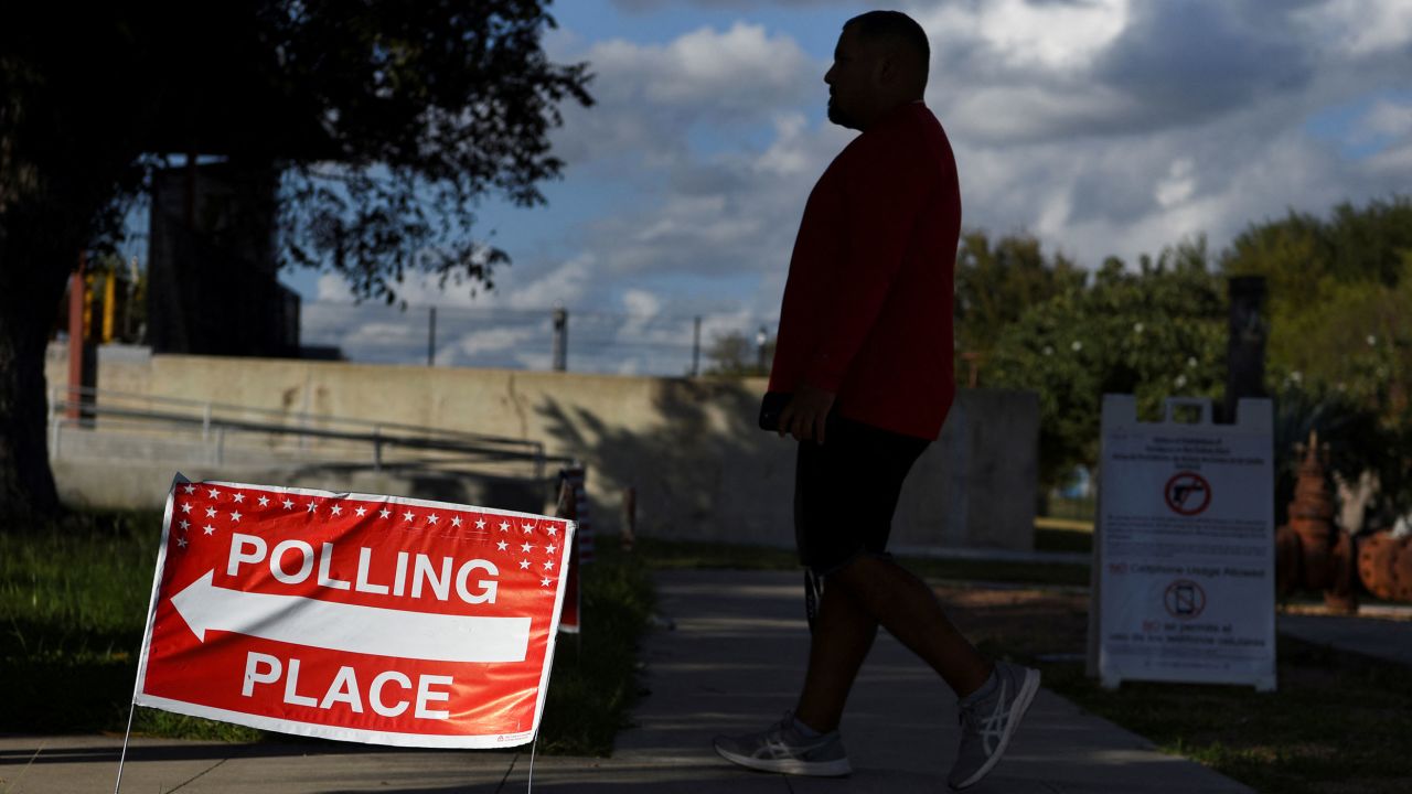 A voter in McAllen, Texas, waits in line to cast a ballot on November 8, 2022.