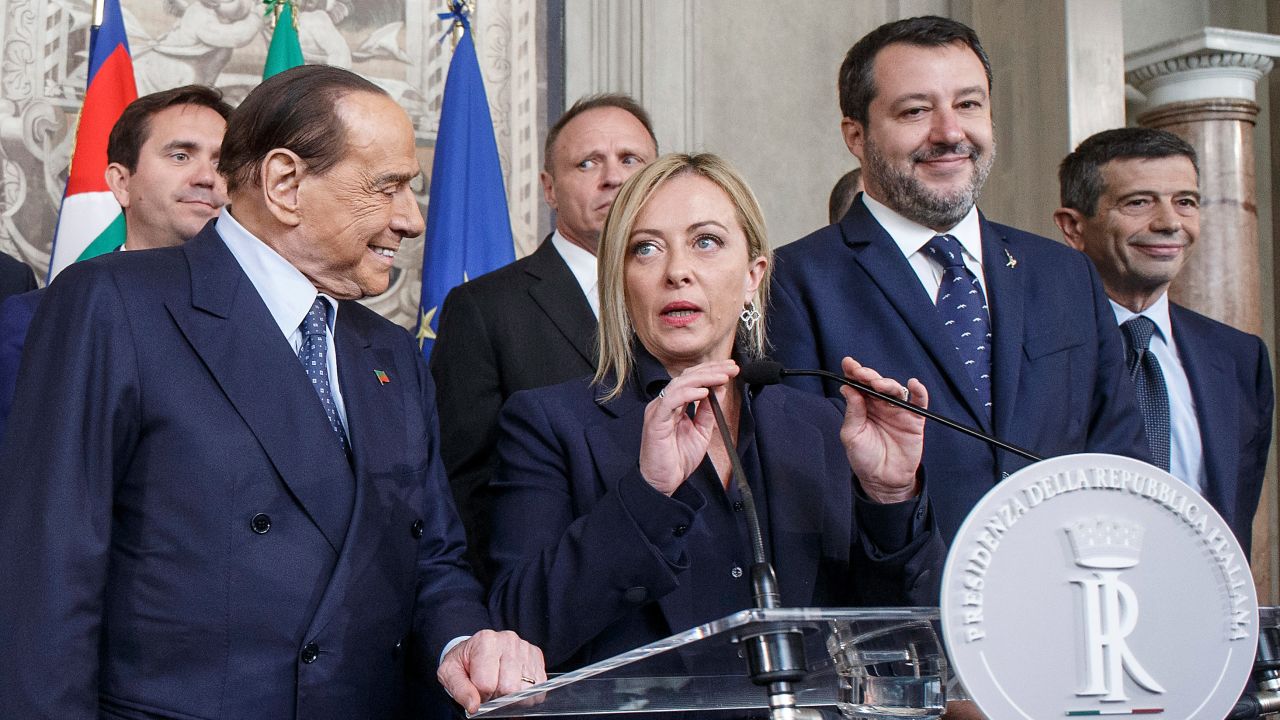 Italian Prime Minister Giorgia Meloni, center, flanked by coalition partners Silvio Berlusconi, left, and  Matteo Salvini, right, on October 21, 2022. 