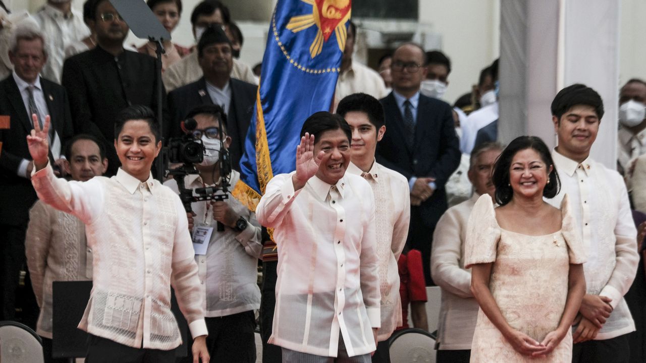 Ferdinand "Bongbong" Marcos Jr., the Philippines' president, center, waves during the swearing-in ceremony in Manila, on June 30, 2022. 