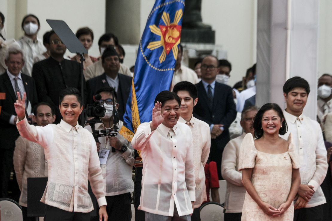 Ferdinand "Bongbong" Marcos Jr., the Philippines' president, center, waves during the swearing-in ceremony in Manila, on June 30, 2022. 