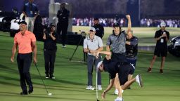BELLEAIR, FLORIDA - DECEMBER 10:  Jordan Spieth of the United States and Justin Thomas of the United States celebrate on the fourth hole as Tiger Woods of the United States and Rory McIlroy of Northern Ireland look on during The Match 7 at Pelican Golf Club on December 10, 2022 in Belleair, Florida. (Photo by David Cannon/Getty Images for The Match)
