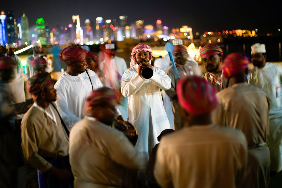 A musician from Oman perform traditional music at the Corniche sea promenade in Doha, Qatar, Saturday, Nov. 26, 2022.