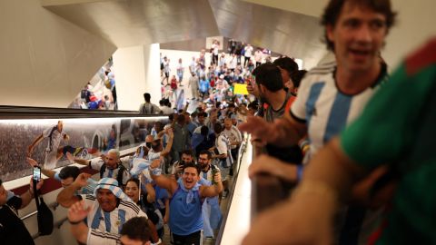 Fans are seen on the Doha Metro ahead of the match between Argentina and Mexico.