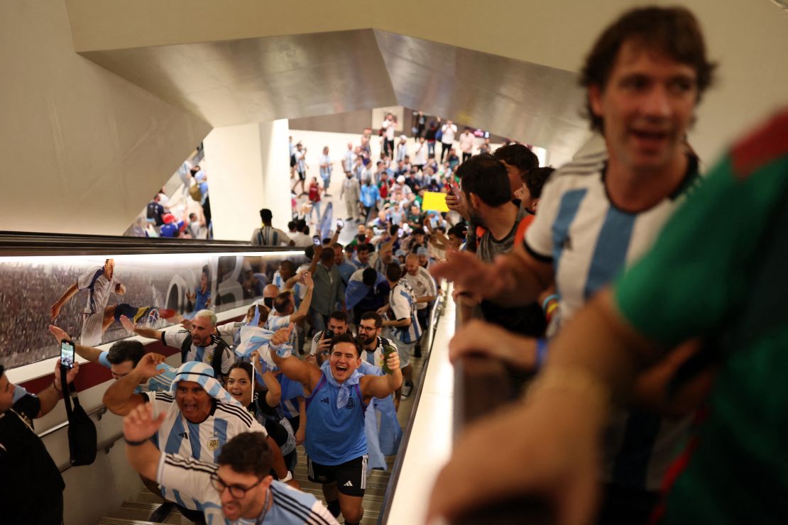 Fans are seen on the Doha Metro ahead of the match between Argentina and Mexico.