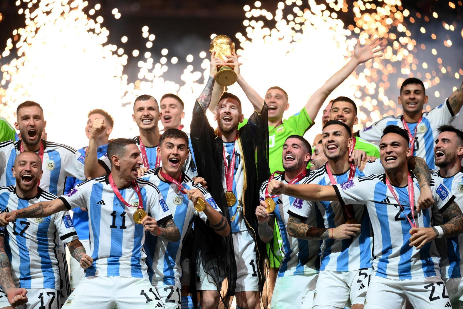 Messi lifts the World Cup trophy.