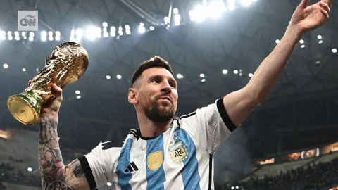Messi of Argentina poses with the Golden Ball award, which is given to the best player at the World Cup. 