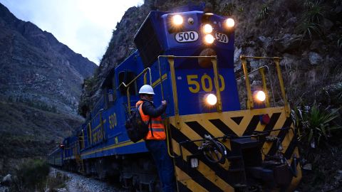 A train carrying stranded tourists arrives in Ollantaytambo, Peru, on December 17.