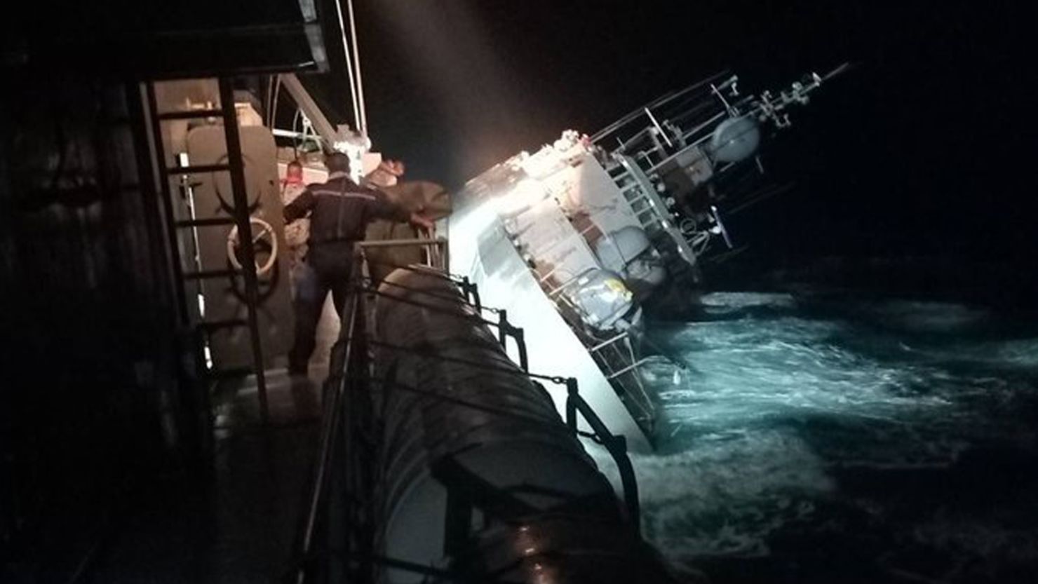 The Royal Thai Navy ship Sukhothai lists heavily before sinking in the Gulf of Thailand early Monday morning.