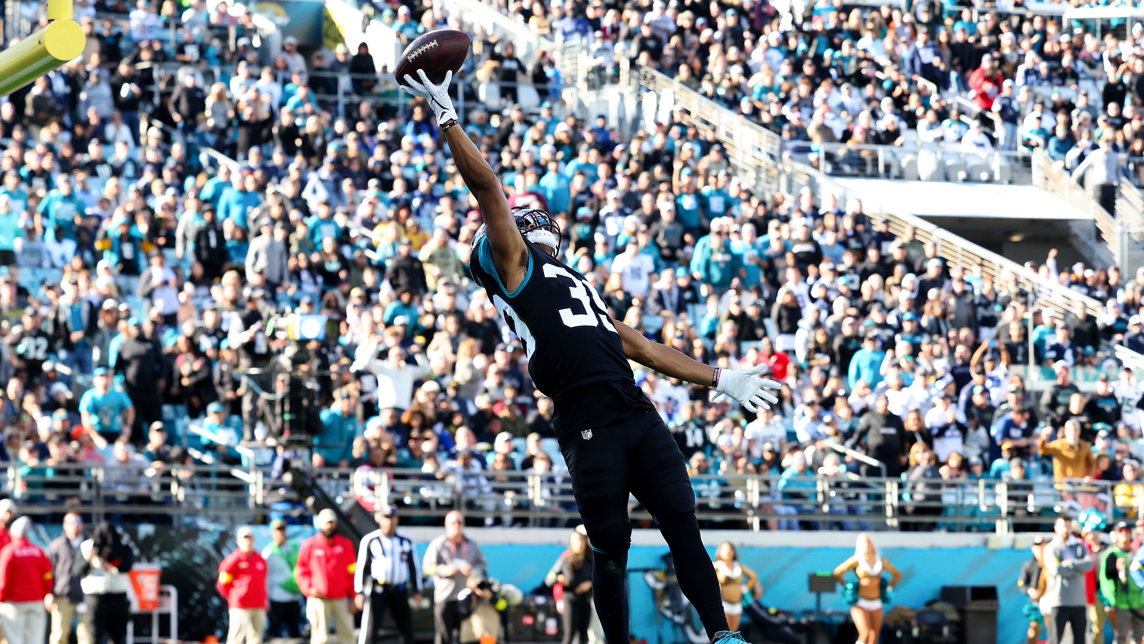 Jamal Agnew of the Jacksonville Jaguars attempts to catch a pass against the Dallas Cowboys during the second half. The Cowboys lost 40-34 in overtime after Rayshawn Jenkins' 52-yard interception was returned for a touchdown. 