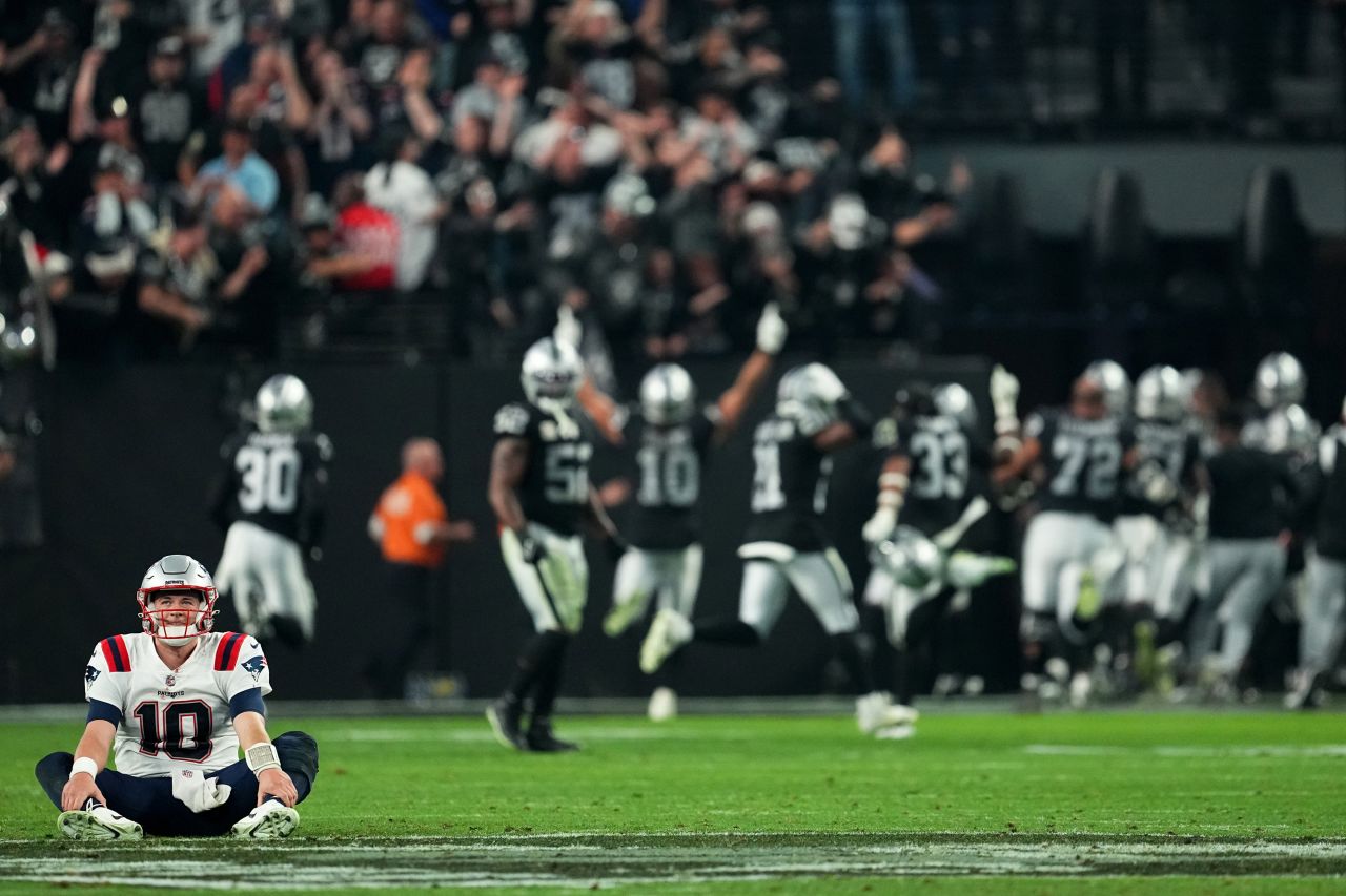 Mac Jones of the New England Patriots reacts after a Patriots turnover led to the Las Vegas Raiders scoring a game-winning touchdown as the clock expired in Las Vegas on Sunday, December 18. <a href="https://www.cnn.com/2022/12/19/sport/las-vegas-raiders-new-england-patriots-spt-intl/index.html" target="_blank">The Raiders won 30-24.</a>
