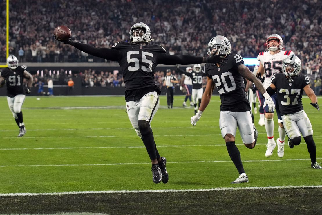 Las Vegas Raiders defensive end Chandler Jones celebrates after scoring a touchdown against the New England Patriots. 